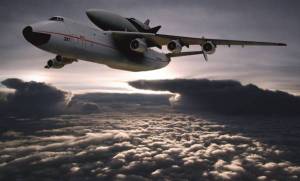 Обои реактивный самолёт Ан-225 «Мрия» над облаками на рабочий стол