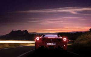 Обои Ferrari 458 Italia едит по дороге на закате солнца на рабочий стол