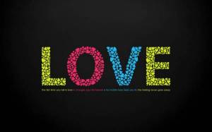 Обои слово Love из разноцветных сердечек на сером фоне на рабочий стол