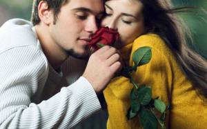 Обои красивое фото влюбленной пары с цветком розы на рабочий стол