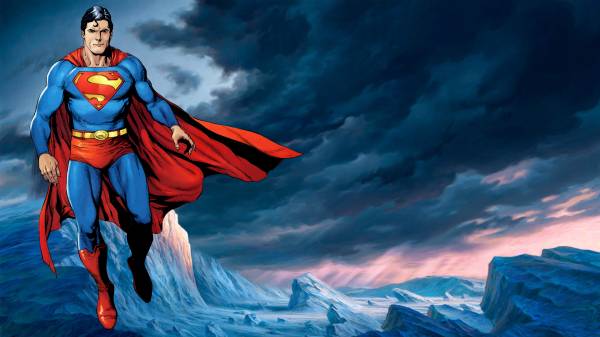 супермен возле заснеженных скал обои для рабочего стола