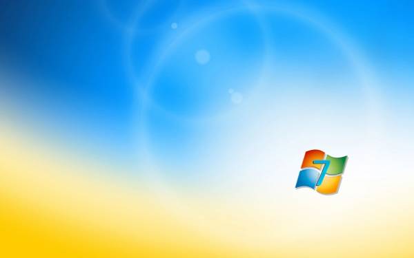 эмблема ОС Windows 7 на сине-желтом фоне обои для рабочего стола